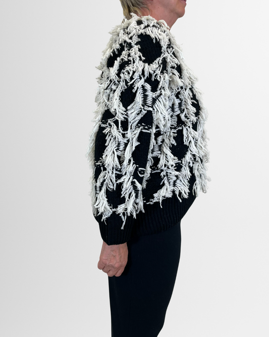 Pullover nero frange bianche