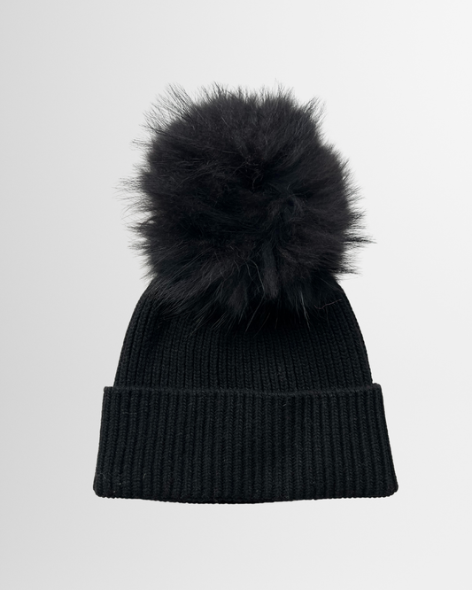 Berretto con pon-pon nero
