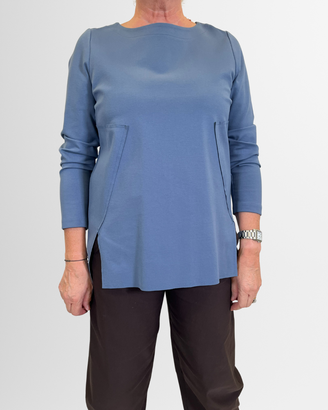 Casacca azzurra asimmetrica