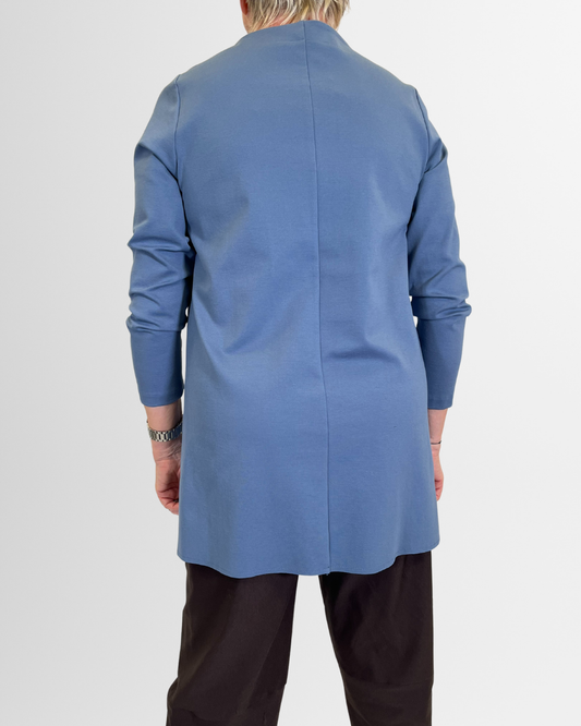 Casacca azzurra asimmetrica